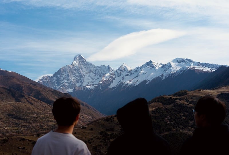 Hiker conquering a mountain